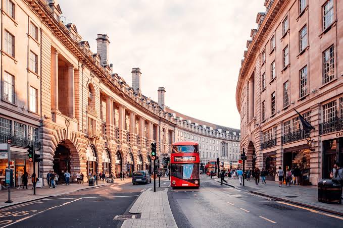 London street with a red double-decker bus